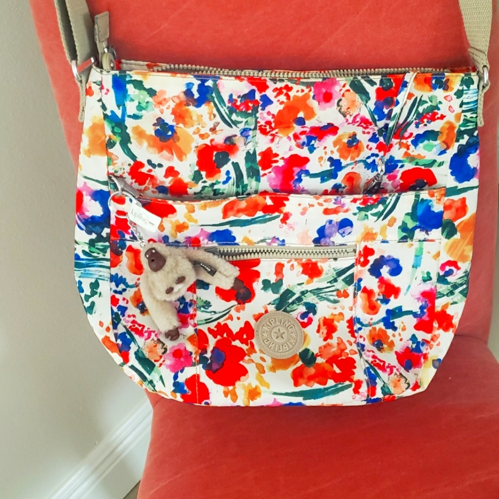 Kipling, large EUC floral cross body bag.